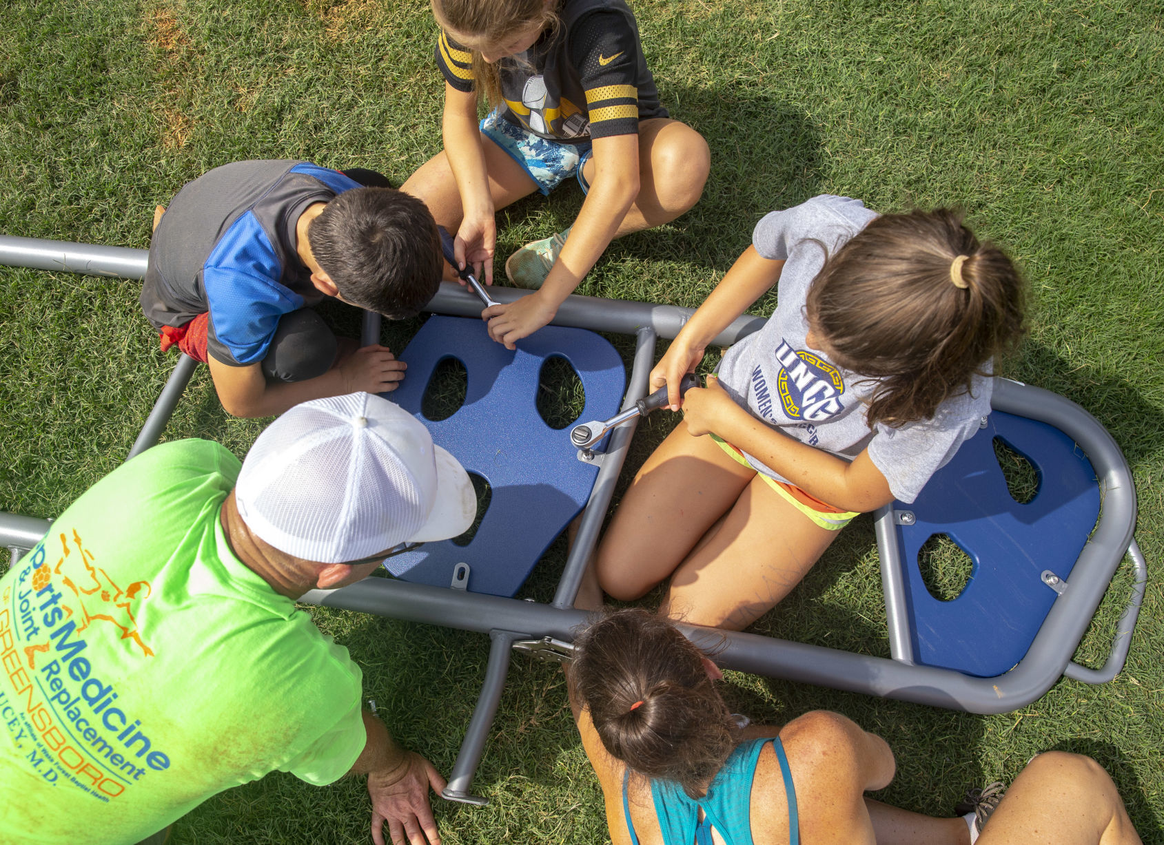Volunteers assemble playground